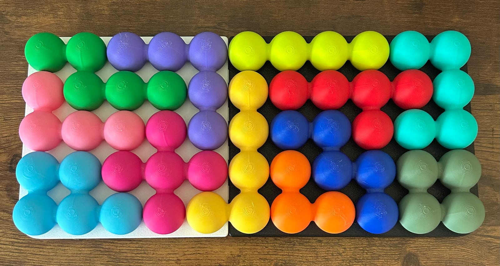Katachi-Go spatial logic puzzle tray solved with colorful pieces